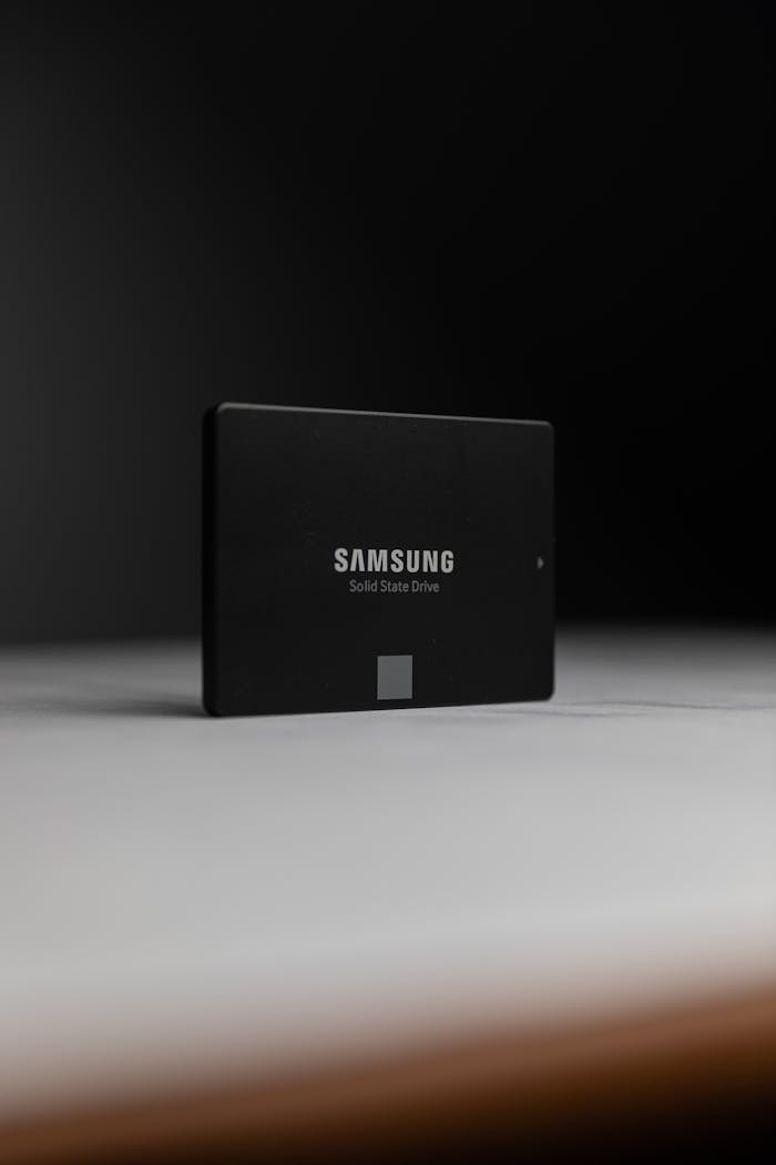 pexels photo 11216304 Close-up of a Samsung solid-state drive on a dark surface, modern technology.