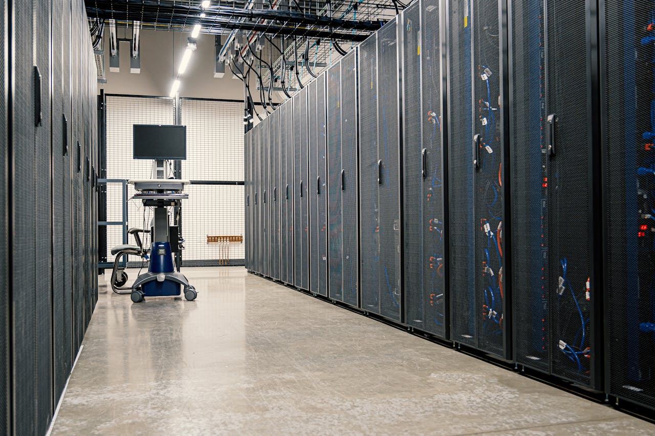 services-01 Modern data center corridor with server racks and computer equipment. Ideal for technology and IT concepts.